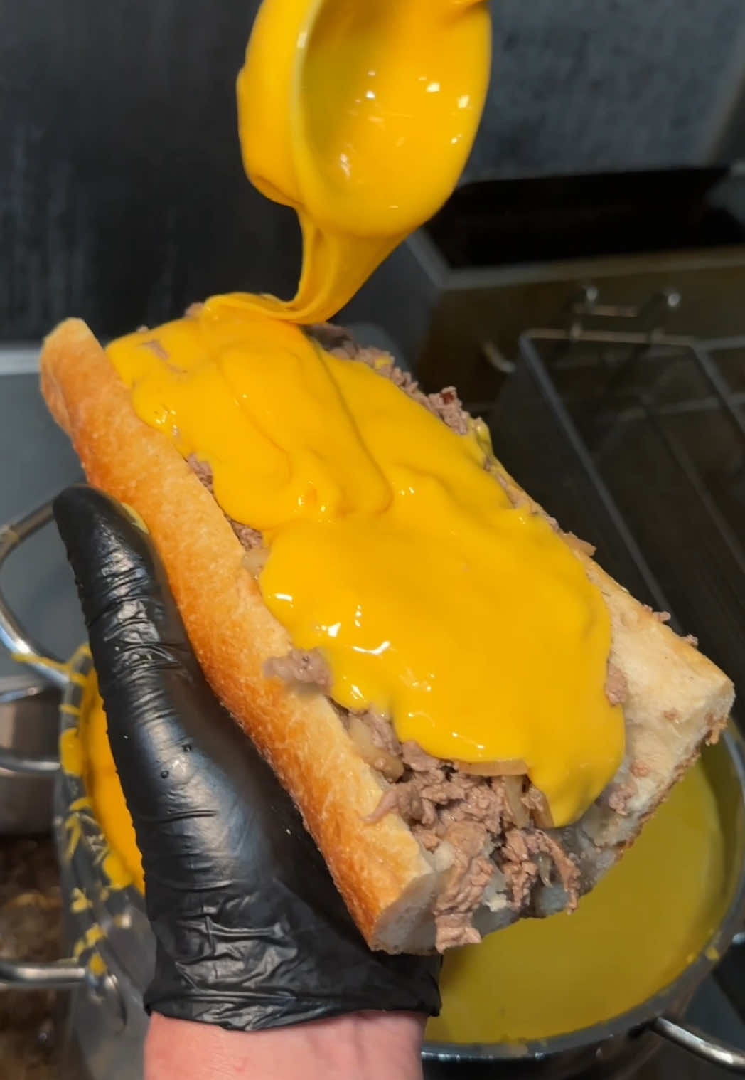 This Williamsburg Spot's Philly Cheesesteak Is Drenched In A Massive Waterfall Of Melted Whiz
